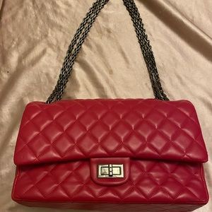 Beautiful pink cc replica. A few nicks in the material but never worn